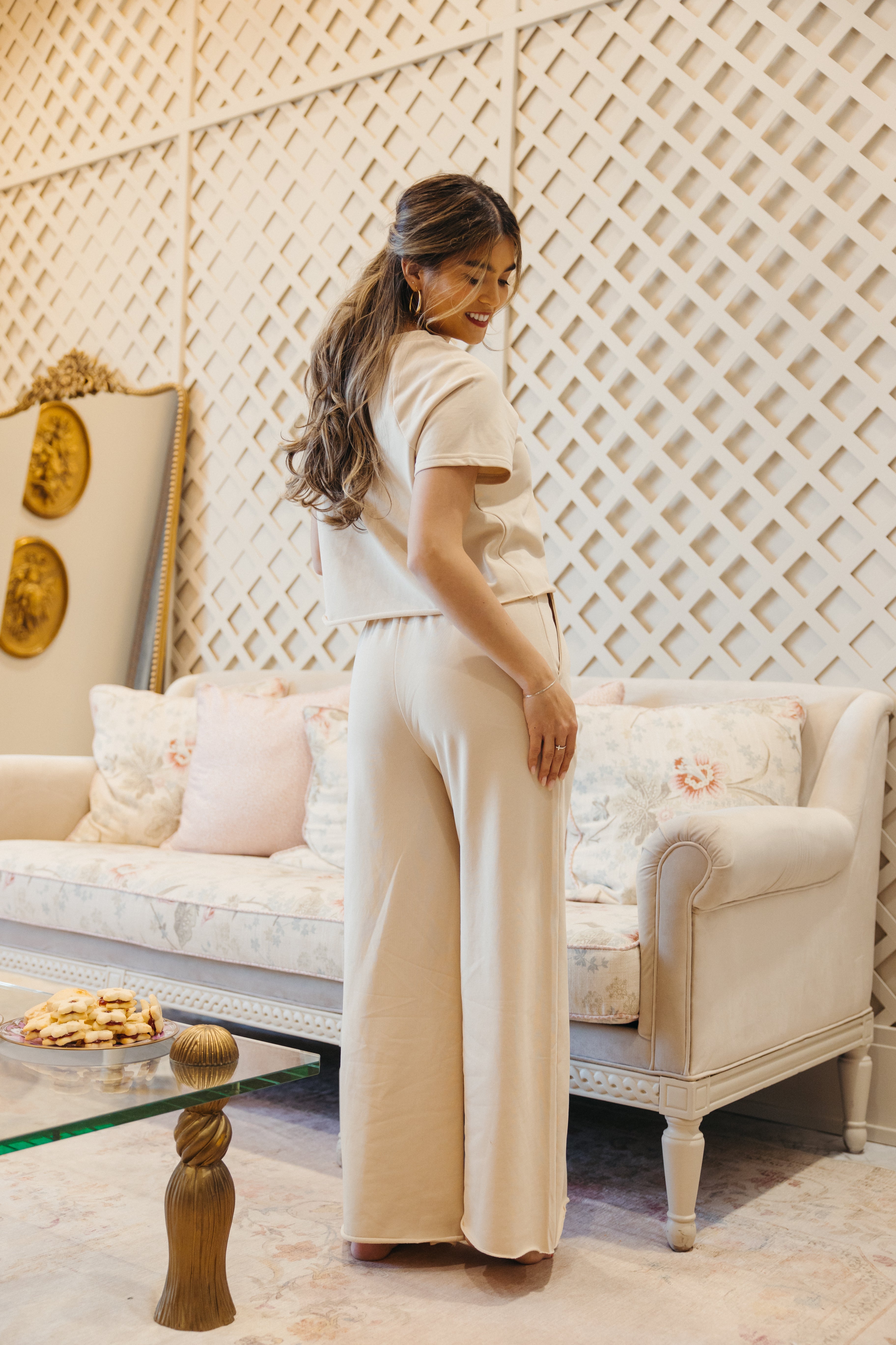 Model is wearing comfy short sleeve and pant set.