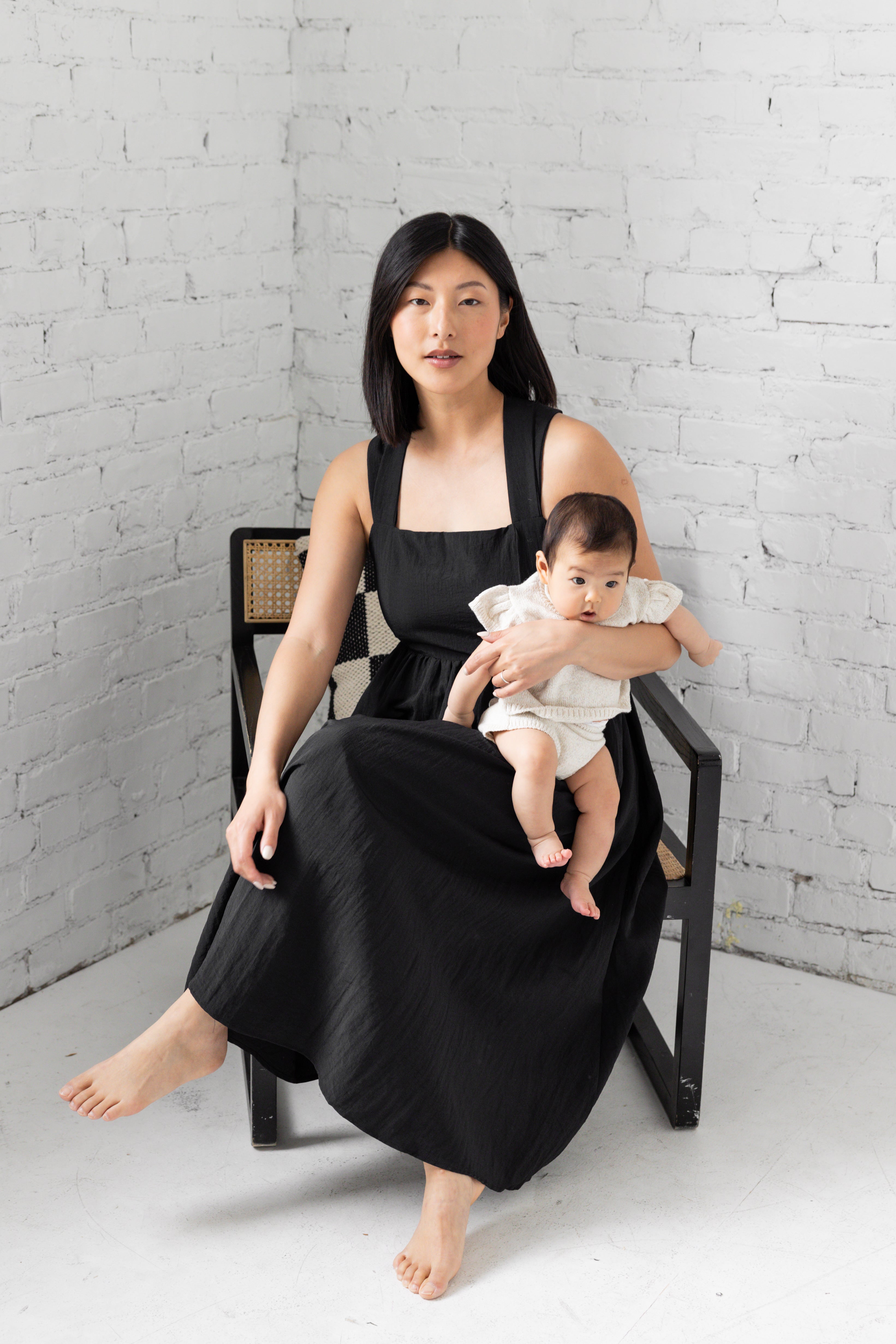 Model is wearing square neck tank top midi loose dress.