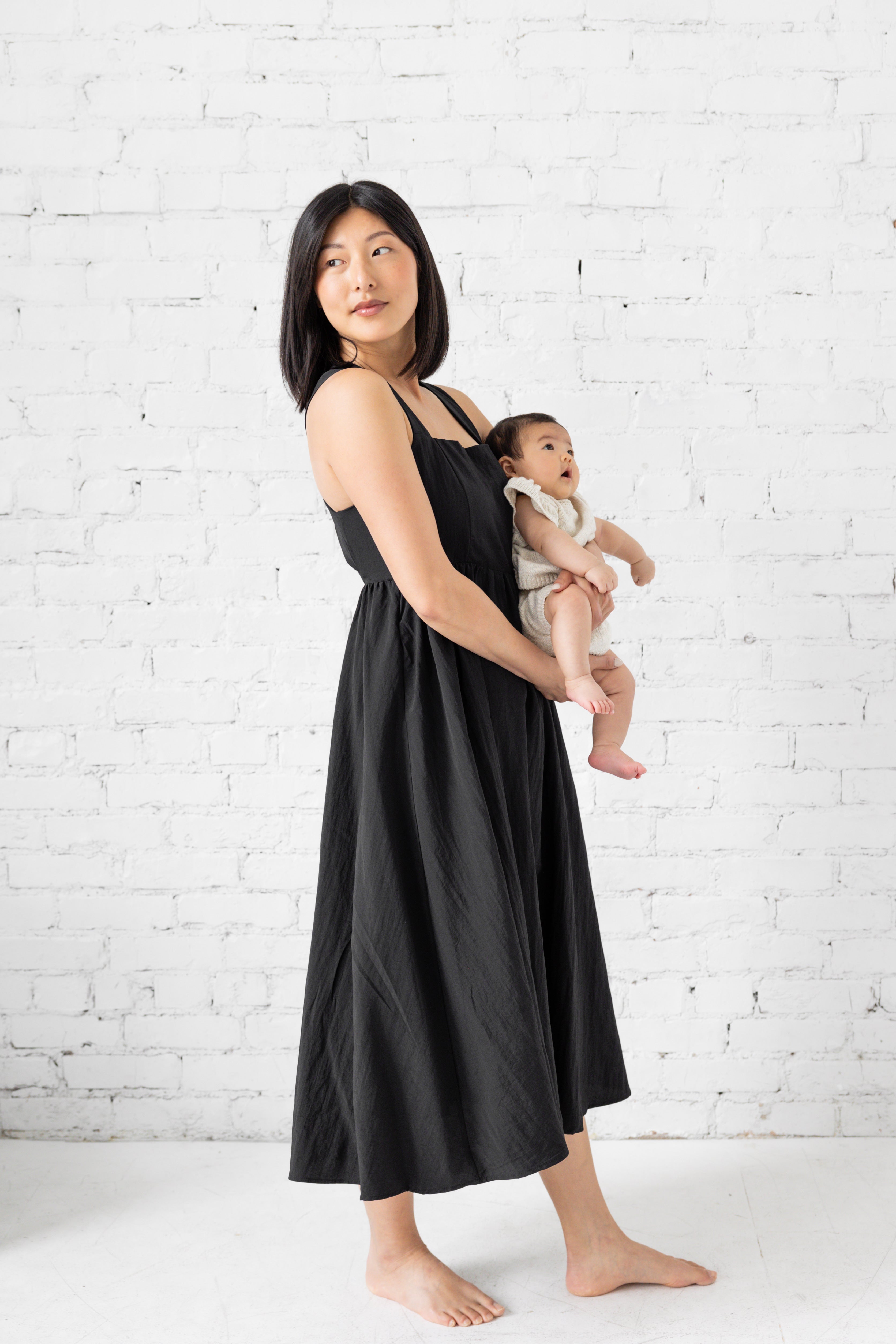 Model is wearing square neck tank top midi loose dress.