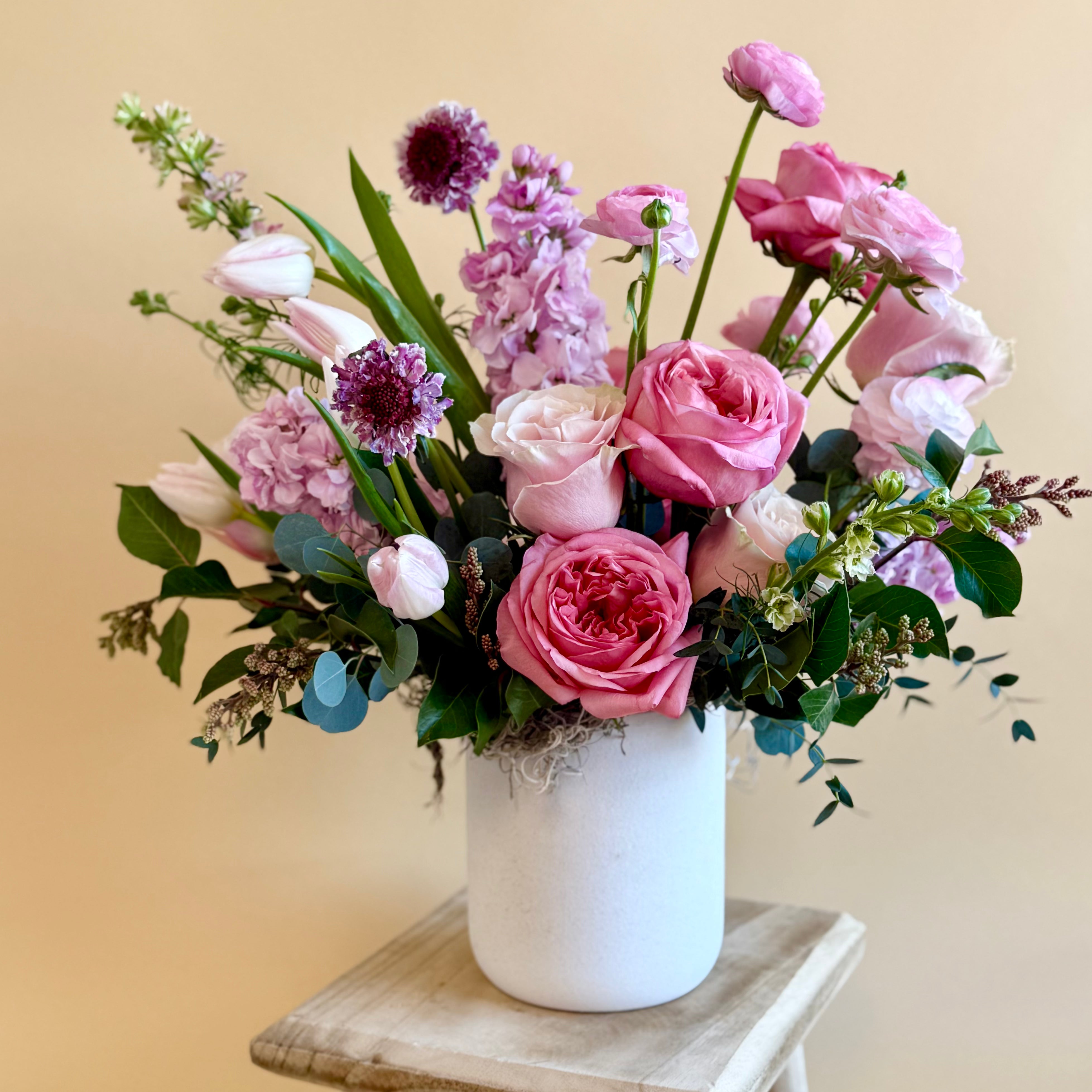 Purple and pink floral vase arrangement 