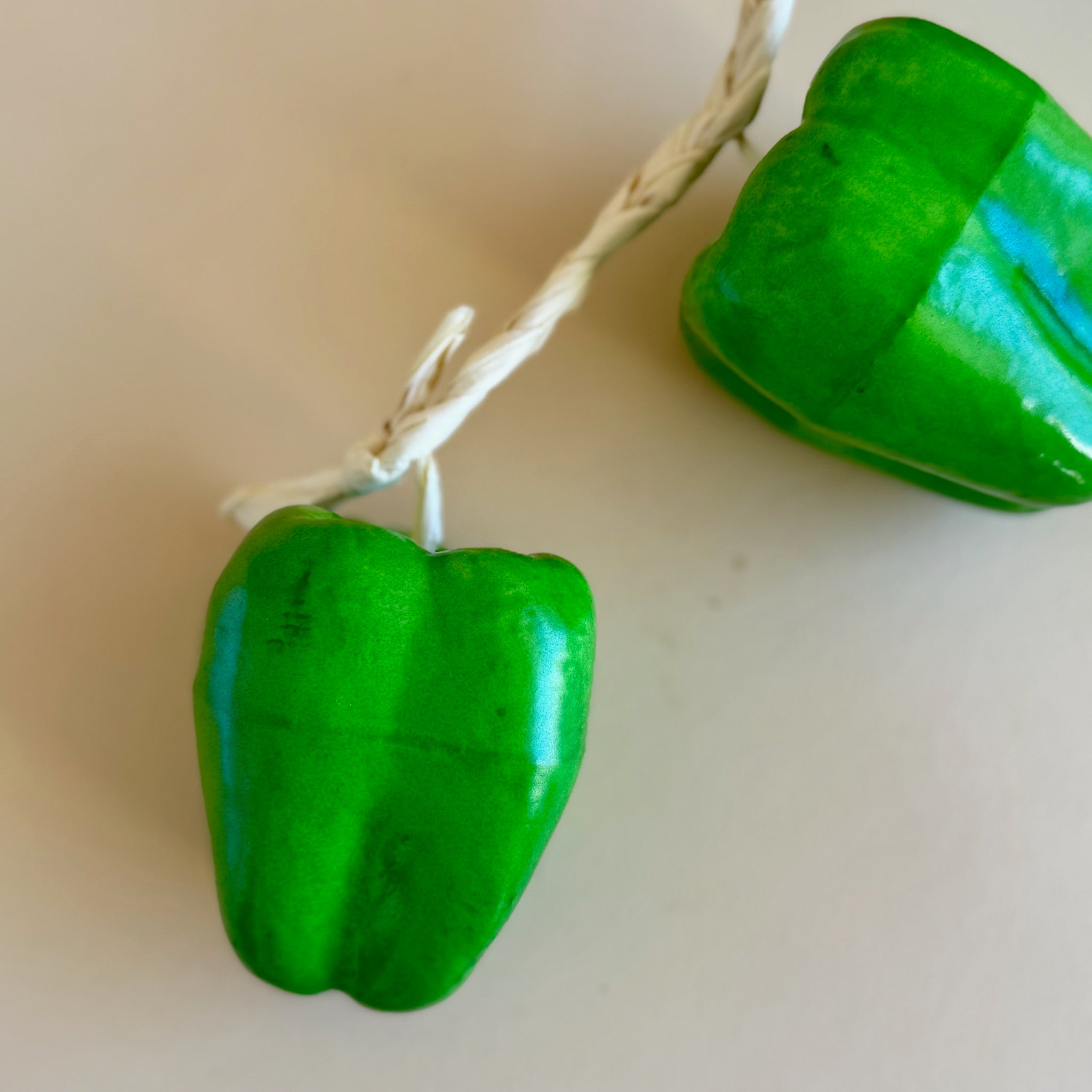 String of Green Bell Peppers