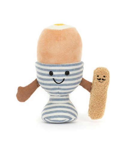 Plush toy egg and French baguette with face and hands holding eachother