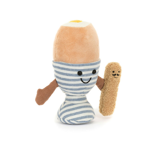 Plush toy egg and French baguette with face and hands holding eachother