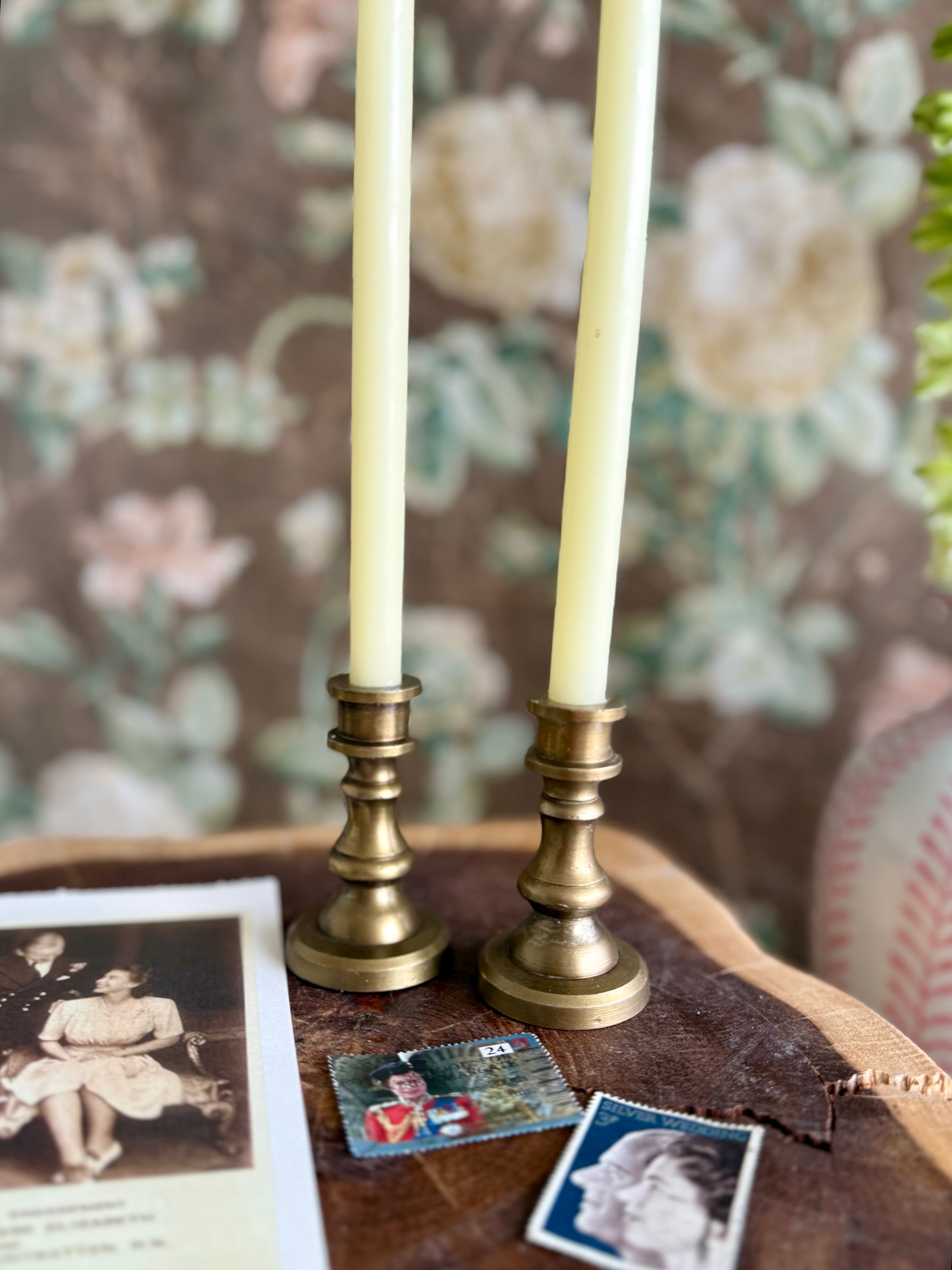 Product shoot of antique brass taper holder.