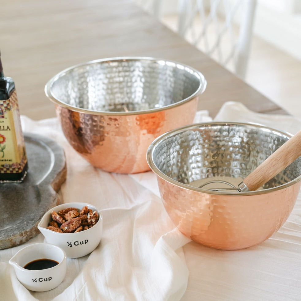 Product shoot of hammered copper bowls.