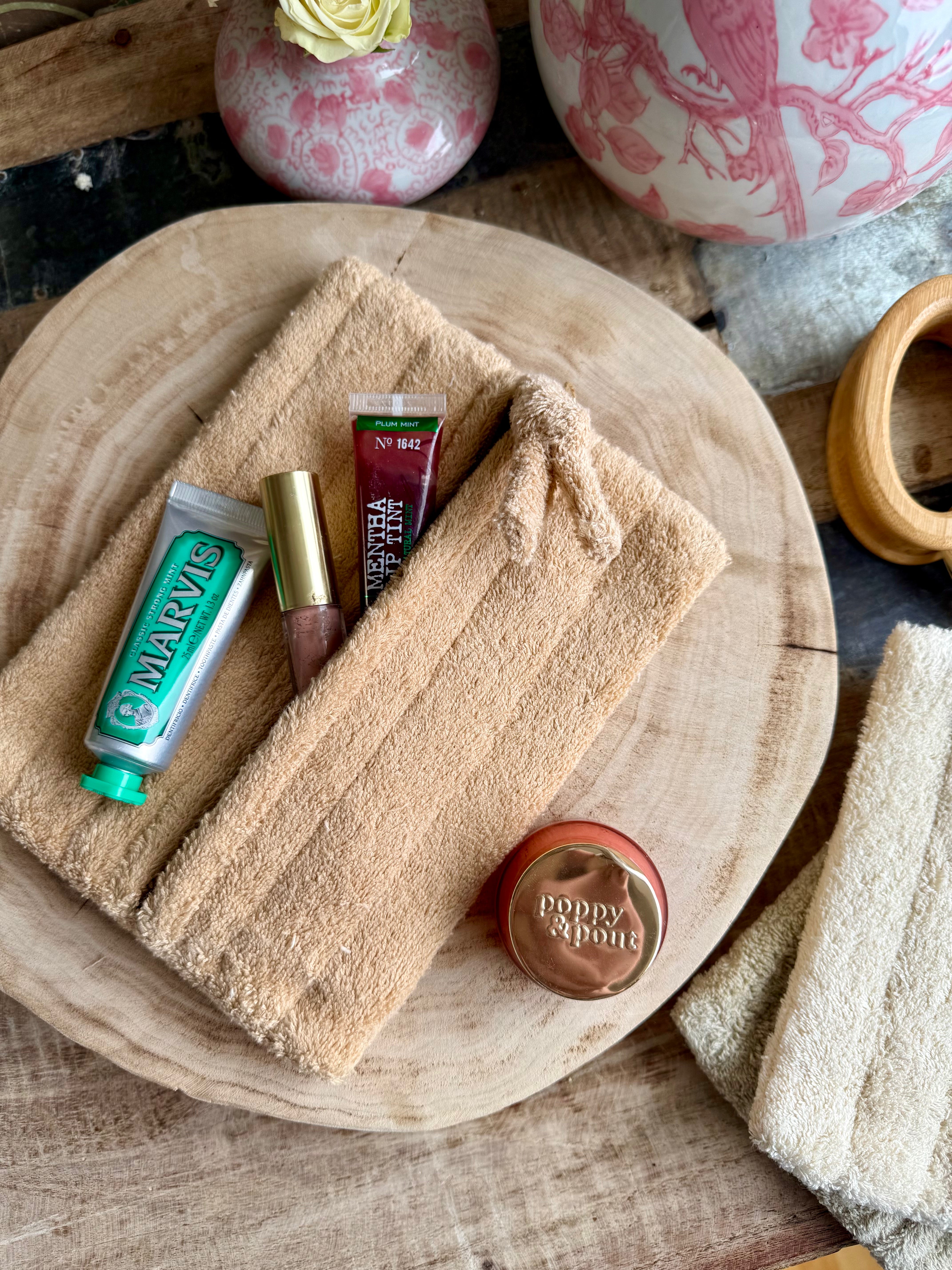 Product shoot of quilted cotton terry zip pouches. 